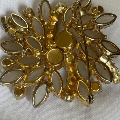 Faux pearls and stunning brooch