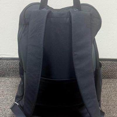 Sale Photo Thumbnail #594: Approx. 11" wide and 15" tall - laptop storage, phone pocket and luggage band. Very good condition, clean inside and out.