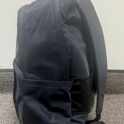 Sale Photo Thumbnail #595: Approx. 11" wide and 15" tall - laptop storage, phone pocket and luggage band. Very good condition, clean inside and out.