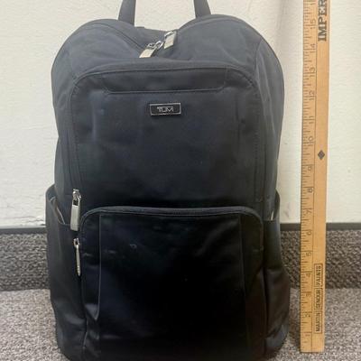 Sale Photo Thumbnail #596: Approx. 11" wide and 15" tall - laptop storage, phone pocket and luggage band. Very good condition, clean inside and out.