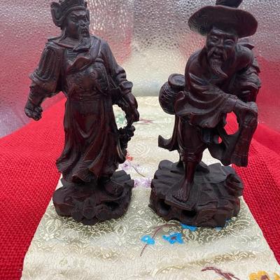Sale Photo Thumbnail #174: 1 Fisherman  2.75 wide x 6 inches tall.  
Small chip on fisherman net
Enlarge the screen to see that the red spot is from the background, not a mark.

1 Warrior
2.5 inches wide x 6 inches tall

Retail for both pieces is $ 175
Very good condition