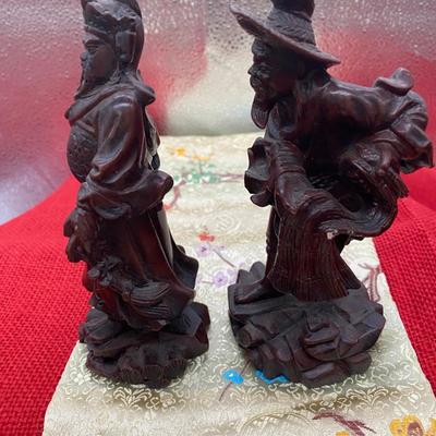 Sale Photo Thumbnail #177: 1 Fisherman  2.75 wide x 6 inches tall.  
Small chip on fisherman net
Enlarge the screen to see that the red spot is from the background, not a mark.

1 Warrior
2.5 inches wide x 6 inches tall

Retail for both pieces is $ 175
Very good condition