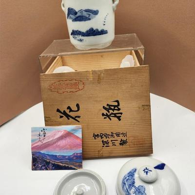 Sale Photo Thumbnail #188: Japanese, presented in  original box wth picture of Mt. Fuji, mid 20th Century.
Hand painted high quality porcelain.  The tea caddy has a double lid.  
Retails at $200