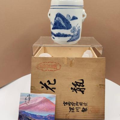 Sale Photo Thumbnail #187: Japanese, presented in  original box wth picture of Mt. Fuji, mid 20th Century.
Hand painted high quality porcelain.  The tea caddy has a double lid.  
Retails at $200
