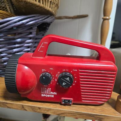 Flash light with radio