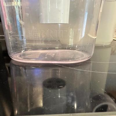 KEURIG SINGLE CUP COFFEE MAKER, BRITA WATER FILTRATION AND 2 LARGE PITCHERS