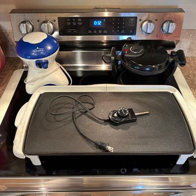 ROTARY WAFFLE MAKER, RIVAL TEFLON GRIDDLE AND A RICE STEAMER