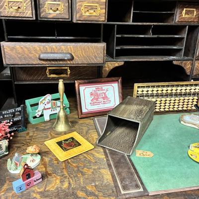 Antique Derby Roll Top Desk in Excellent condition—solid oak--32 1/2 inches deep x 53 1/2 inches wide x 51 inches high at its highest...