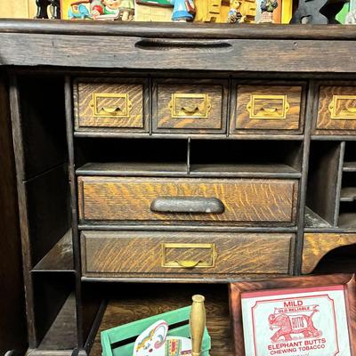 Antique Derby Roll Top Desk in Excellent condition—solid oak--32 1/2 inches deep x 53 1/2 inches wide x 51 inches high at its highest...