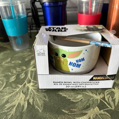 AN ARRAY OF TRAVEL CUPS, DRINKING GLASSES AND MORE