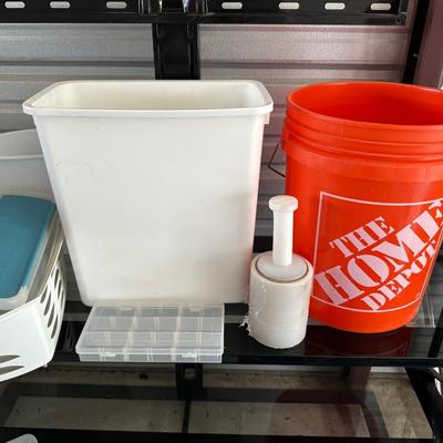 AN ASSORTMENT OF CONTAINERS, HANGERS AND A ROLL OF PLASTIC WRAP