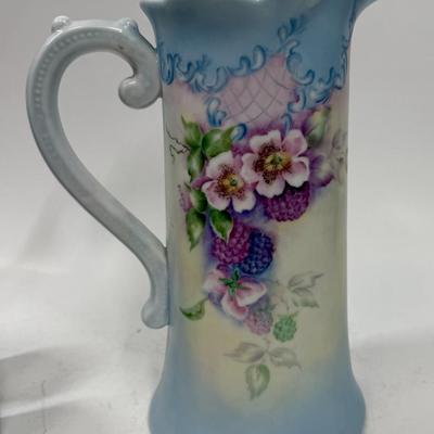 Sale Photo Thumbnail #10: Pale blue and white ceramic pitcher and cups.  Hand painted in 1968 by local artist Dorothy Tillotson of Tustin in 1968.  All in very good condition, no chips or cracks.