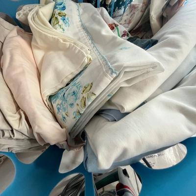 Lot 94 Basket of linens.