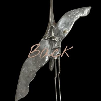 Pewter like bird