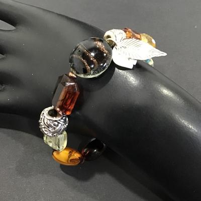 Glass art bead bracelet with charms