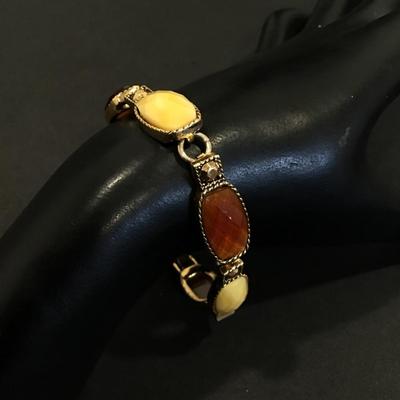 Gold tone faux stone tennis bracelet