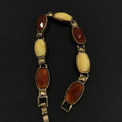 Gold tone faux stone tennis bracelet