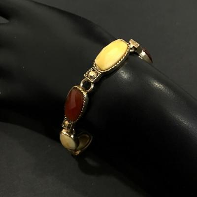 Gold tone faux stone tennis bracelet