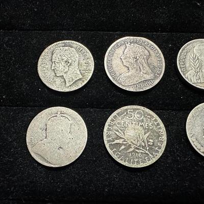1874 VENEZUELAN LEI 835, 1899 GREAT BRITAIN SIX PENCE, 1941 FRENCH INDOCHINE 10 CENTS, 1918 FRENCH 50 CENTIMES, 1931 PANAMA BALBOA DECIMO...