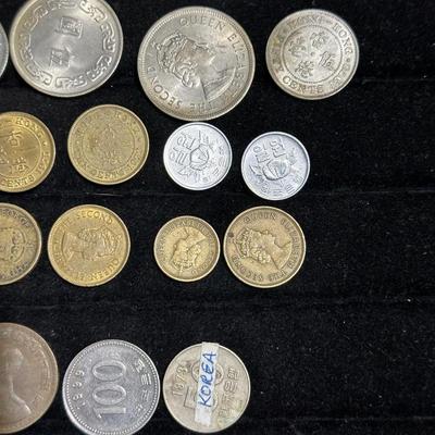 AN ASSORTMENT OF FOREIGN COINS