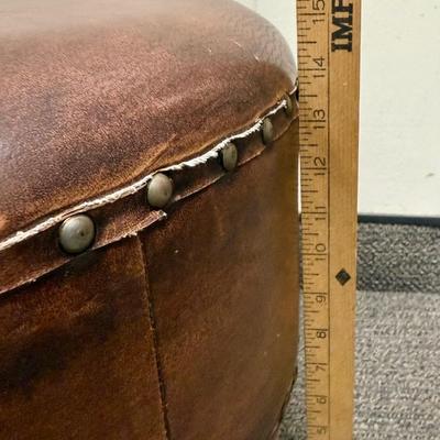 Sale Photo Thumbnail #174: Covered in brown leather, some loose stitching in the top center (see photos).