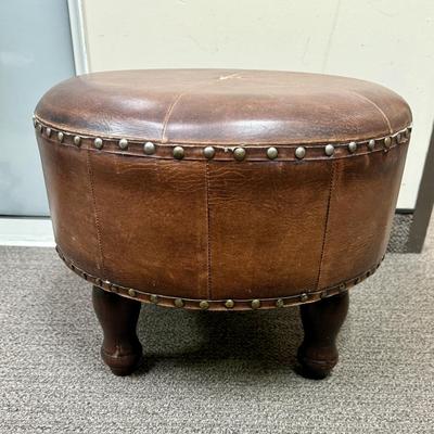 Sale Photo Thumbnail #172: Covered in brown leather, some loose stitching in the top center (see photos).