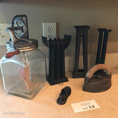 Lot 23 - Antique Churn, Candle Molds, Dubuque Potts Iron and more