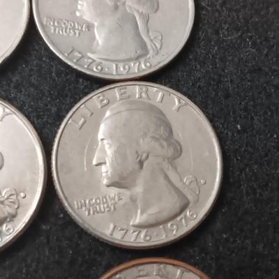 VARIOUS QUARTERS AND 1 SACAGAWEA DOLLAR