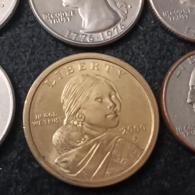 VARIOUS QUARTERS AND 1 SACAGAWEA DOLLAR