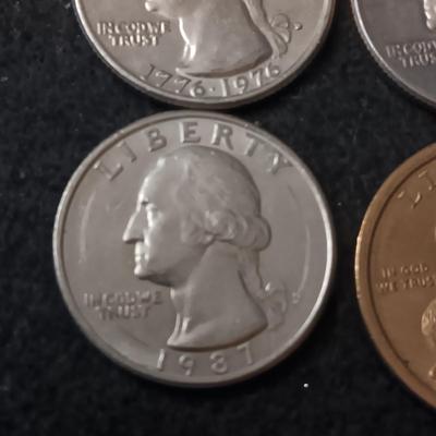 VARIOUS QUARTERS AND 1 SACAGAWEA DOLLAR