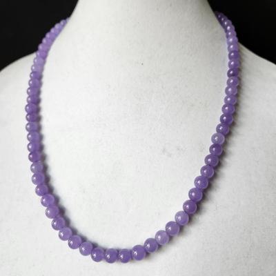 Sale Photo Thumbnail #233: This is so beautiful, solid necklace with tourmaline stone .
Similar prices for this jade is about $200