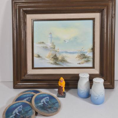 LOT 81L: Signed Seascape Oil Painting by Carson, Coasters, Salt & Pepper Shakers, Cast Iron Fisherman , and Lighthouse Print