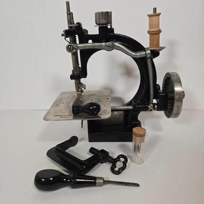 LOT 89L: Antique Spenser Hand Crank Sewing Machine, and Sew Many Sewing and Crafting Accessories and Tools (Did You See What I did There?)