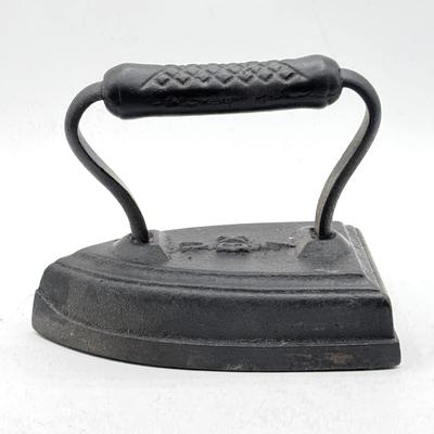 LOT 115X: Vintage Cast Iron Greek Collumned Bookends and 2 Sad Iron Doorstops and a Black Cat Doorstop