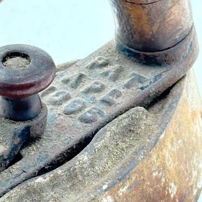 LOT 115X: Vintage Cast Iron Greek Collumned Bookends and 2 Sad Iron Doorstops and a Black Cat Doorstop
