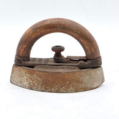 LOT 115X: Vintage Cast Iron Greek Collumned Bookends and 2 Sad Iron Doorstops and a Black Cat Doorstop