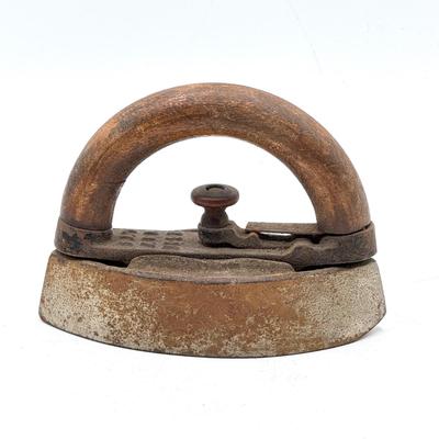 LOT 115X: Vintage Cast Iron Greek Collumned Bookends and 2 Sad Iron Doorstops and a Black Cat Doorstop