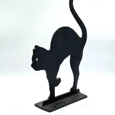 LOT 115X: Vintage Cast Iron Greek Collumned Bookends and 2 Sad Iron Doorstops and a Black Cat Doorstop