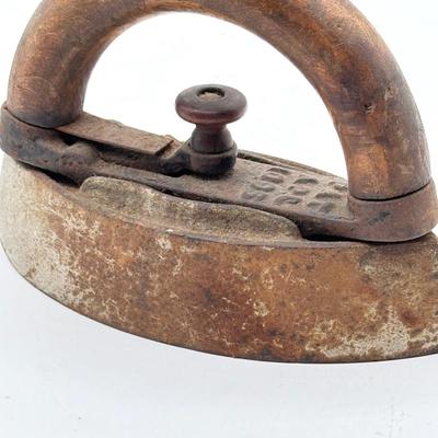 LOT 115X: Vintage Cast Iron Greek Collumned Bookends and 2 Sad Iron Doorstops and a Black Cat Doorstop