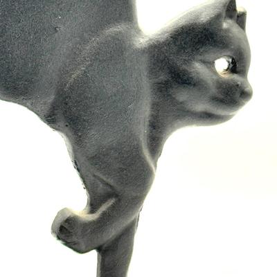 LOT 115X: Vintage Cast Iron Greek Collumned Bookends and 2 Sad Iron Doorstops and a Black Cat Doorstop