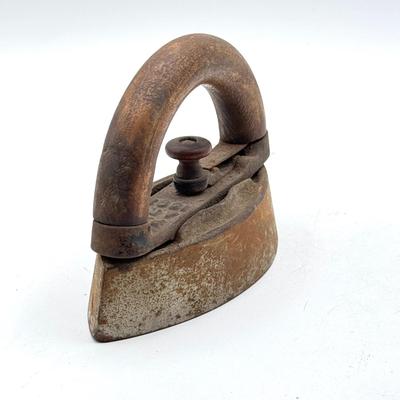 LOT 115X: Vintage Cast Iron Greek Collumned Bookends and 2 Sad Iron Doorstops and a Black Cat Doorstop
