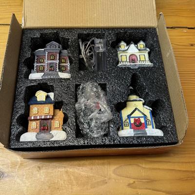 LOT 137B: Vintage Christmas Animated Light Fiber Optic Christmas Village and a Vintage Christmas Village Featuring LED Lights