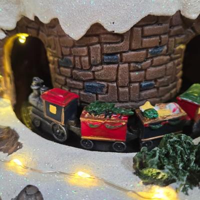 LOT 169X: Alpine Corp. Indoor Animated Winter Wonderland Set with LED lights, Music, Moving Train, and Ice-skaters