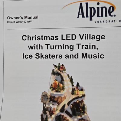 LOT 169X: Alpine Corp. Indoor Animated Winter Wonderland Set with LED lights, Music, Moving Train, and Ice-skaters