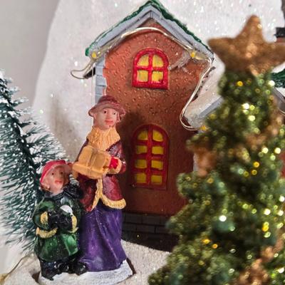 LOT 169X: Alpine Corp. Indoor Animated Winter Wonderland Set with LED lights, Music, Moving Train, and Ice-skaters