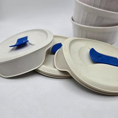LOT 197L: CorningWare French White 20 oz. Meal Mugs with Vented Lids, 16 oz. Round Ramekins with Vented Lids, and Cornflower Blue Pattern...