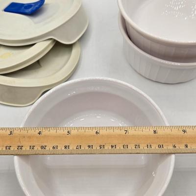 LOT 197L: CorningWare French White 20 oz. Meal Mugs with Vented Lids, 16 oz. Round Ramekins with Vented Lids, and Cornflower Blue Pattern...