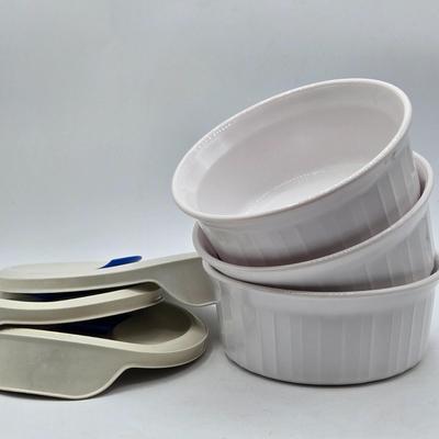 LOT 197L: CorningWare French White 20 oz. Meal Mugs with Vented Lids, 16 oz. Round Ramekins with Vented Lids, and Cornflower Blue Pattern...