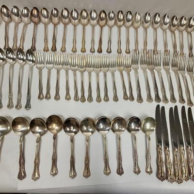 Sale Photo Thumbnail #59: Serving sets for 12,  except missing 1 soup spoon and there are many extra teaspoons and some ice teaspoons.