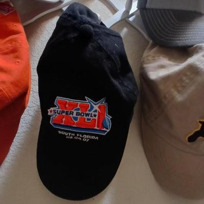 6 Sports Team Baseball Caps with wooden holder